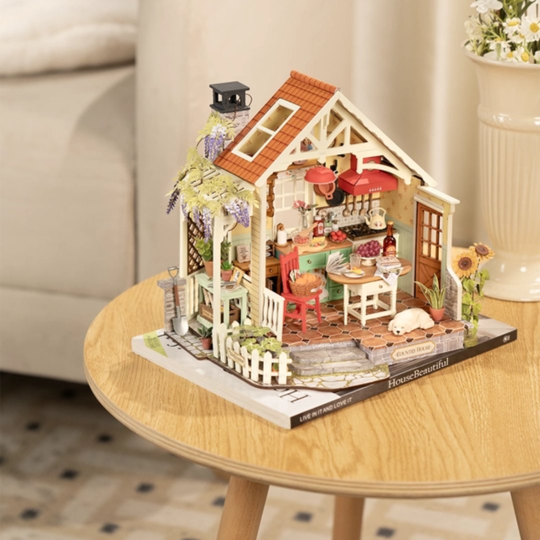 A miniature house scene on a side table